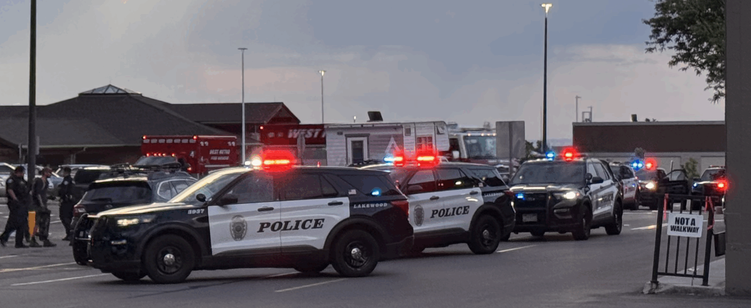 emergency response vehicles in the parking at 12043 W Alameda Pkwy, Lakewood, CO 80228