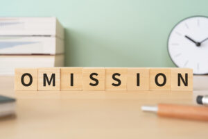 "omission" in scrabble tiles