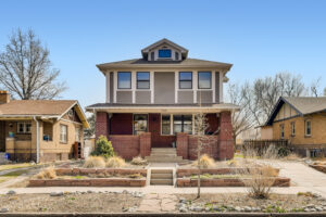 A 2.5 story house with 1 story neighbors