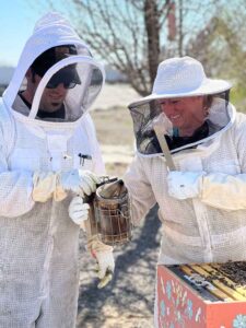 Matt and Sarah McLean in beekeeping gear